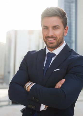 Handsome caucasian businessman - Portrait of a businessman walking outdoors